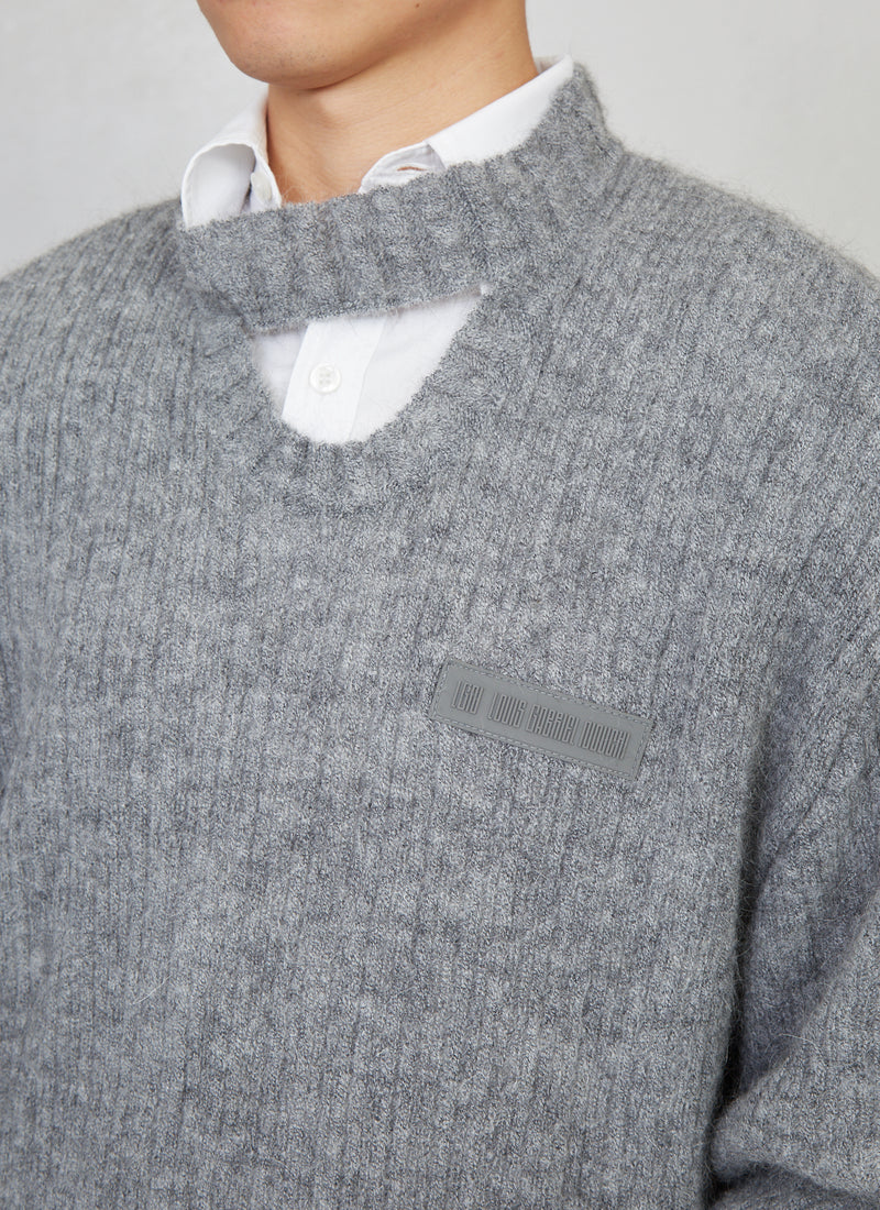 Knitted long-sleeve jumper with signature opening
