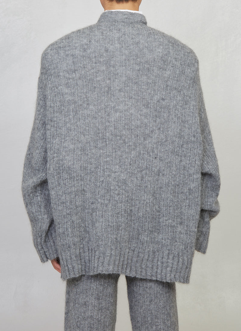 Knitted long-sleeve jumper with signature opening