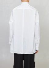 Long shirt with laceration