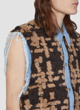 Denim vest with gridded fur