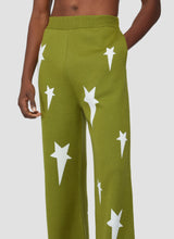 Knit trousers with scattered star pattern