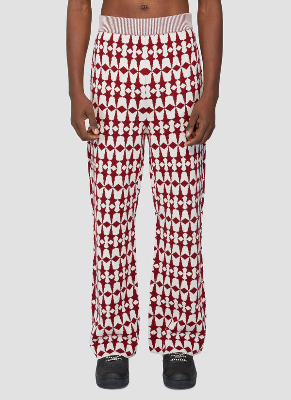 Houndstooth knit trousers with star pattern